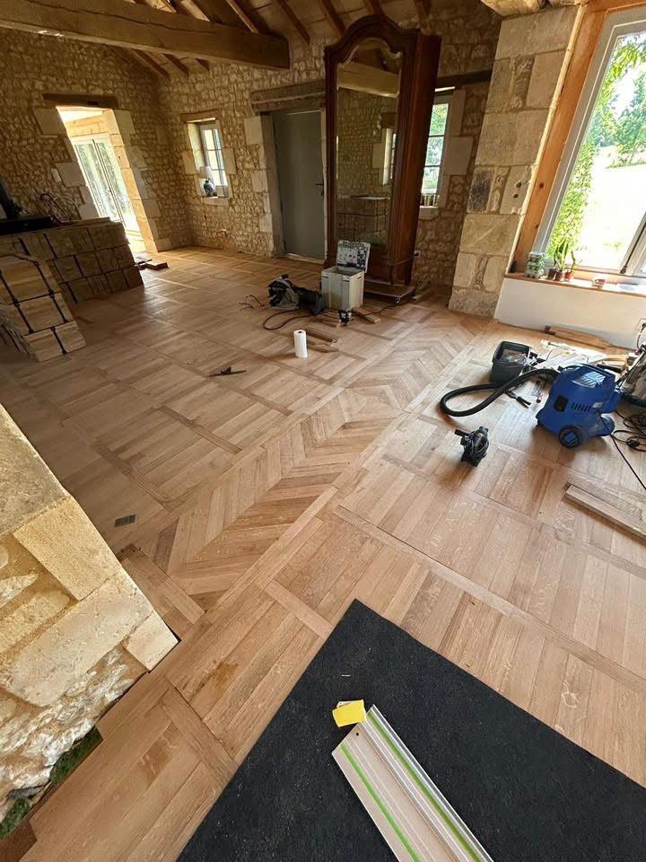 Pose de parquet en cours et finie