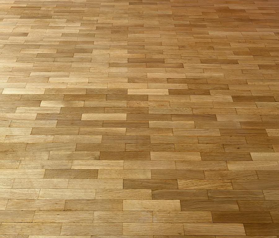 Le parquet poncé et vitrifié, teinte du bois retrouvée — rénovation d’appartement à Paris 16e | GLOBAL CONSTRUCTION
